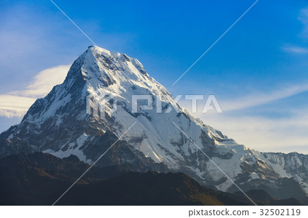 Snowy mountain with clouds. Snowy mountain with clouds. 32502119