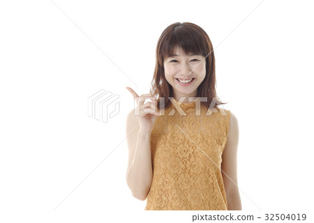 A woman with a pointing pose A woman with a pointing pose 32504019