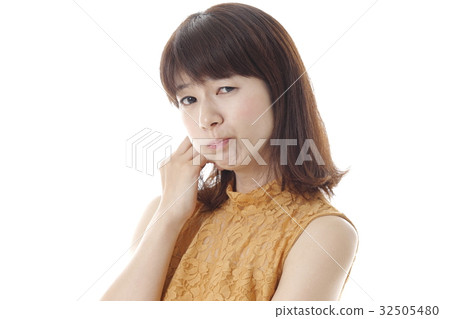 A woman with a troubled look A woman with a troubled look 32505480