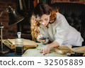 funny woman looking through a magnifying glass to 32505889