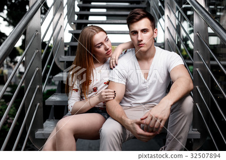 Portrait of young modern couple in love, posing 32507894