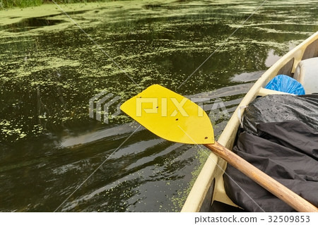 Canoing on a river Canoing on a river 32509853