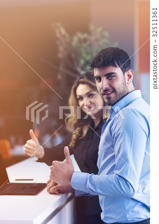 Young couple working together on a laptop in the 32511361