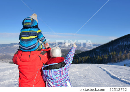 Father, mother and children are having fun and 32512732