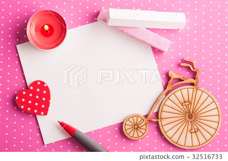 Blank card on pink polka dot background with bike Blank card on pink polka dot background with bike 32516733