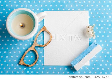 Blue white stars table desk with blank note pad Blue white stars table desk with blank note pad 32516738