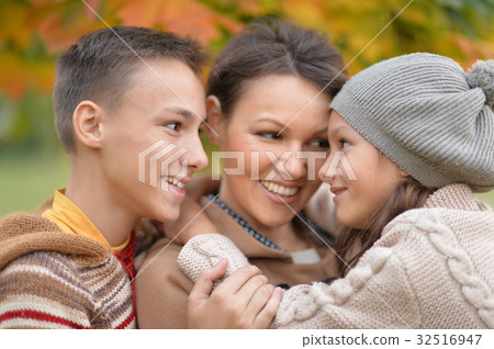happy mother with children outdoors 32516947