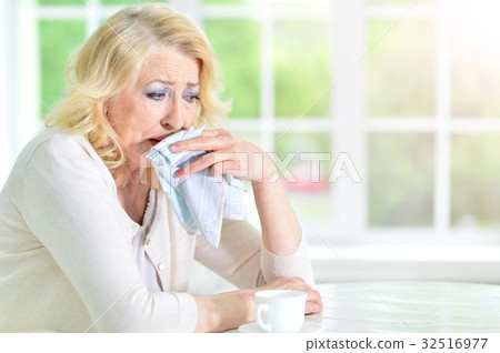 Portrait of sad mature woman Portrait of sad mature woman 32516977