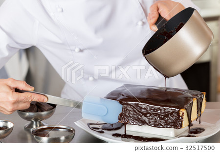 Pastry chef in the kitchen Pastry chef in the kitchen 32517500