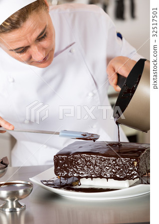 Pastry chef in the kitchen 32517501