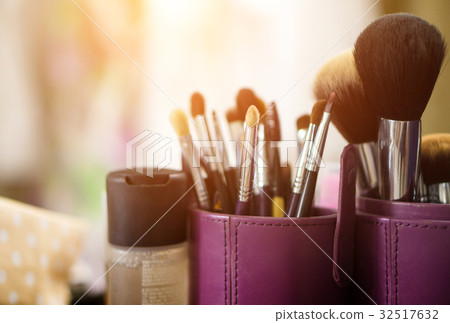 Makeup brush and sunlight background Makeup brush and sunlight background 32517632