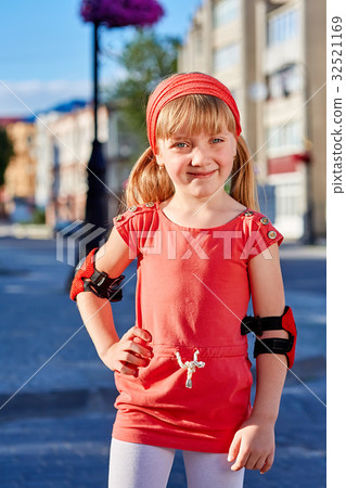 Girl riding on roller skates in skatepark summer Girl riding on roller skates in skatepark summer 32521169