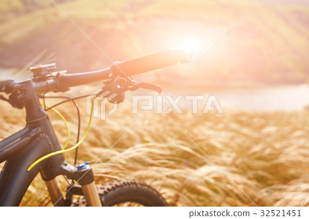 handlaber of mountain bike against beautiful 32521451