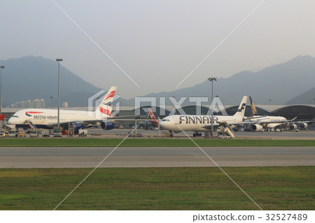 Passenger aircraft on the runway of Hong Kong 32527489