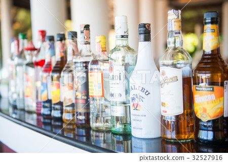 liqour bottles on bar for drink liqour bottles on bar for drink 32527916