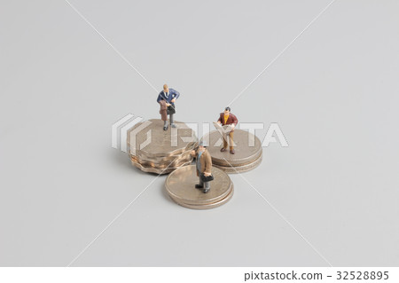 Business man on the top of coins stack 32528895