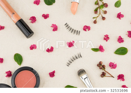 Cosmetics decorated with pink crape myrtle petals 32531696