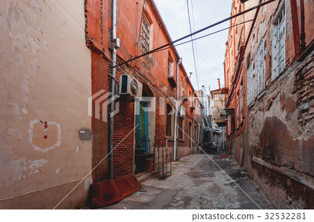 Old narrow street in Tbilisi, Georgia.  32532281