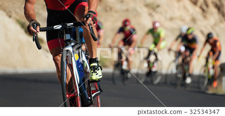 Cycling competition,cyclist athletes riding a race 32534347