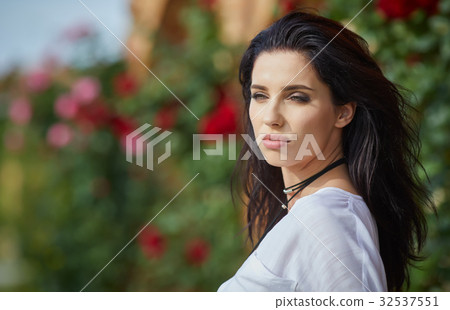Beautiful woman resting in the summer the Italian garden 32537551