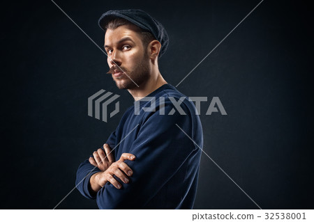 The young man in cap at studio 32538001