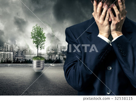 Man in suit closing eyes with hands Man in suit closing eyes with hands 32538115