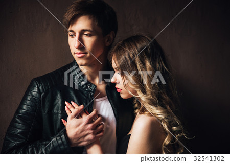 portrait of sexy couple hugging outdoor 32541302