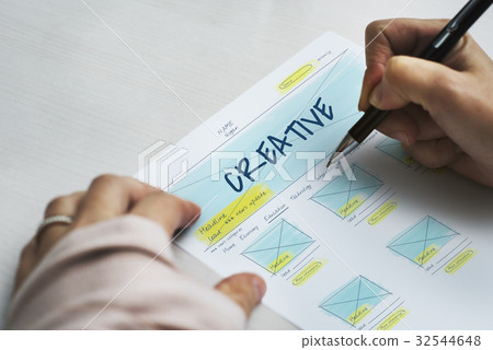 Hands working on paper network graphic overlay Hands working on paper network graphic overlay 32544648