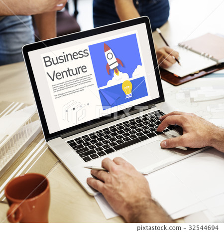 Hands working on laptop network graphic overlay 32544694