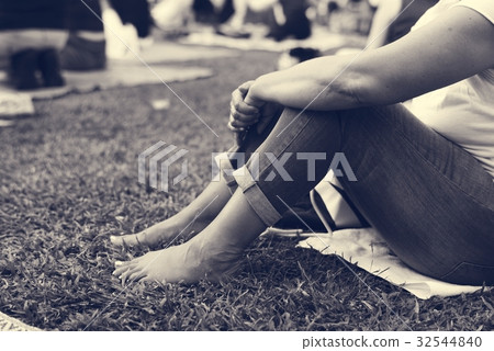 Adult Woman Sitting in The Park Alone 32544840
