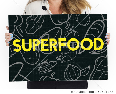 People holding a board about healthy nutrition Veggie 32545772