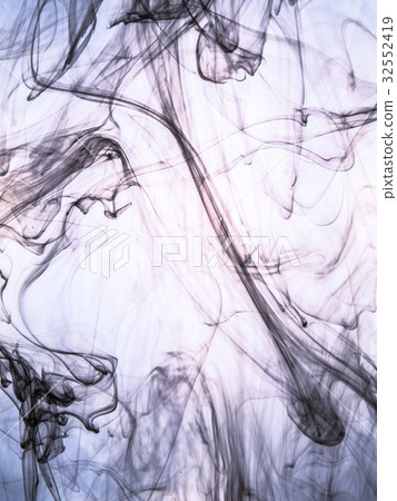 Ink swirl in a water on color background. The Ink swirl in a water on color background. The 32552419
