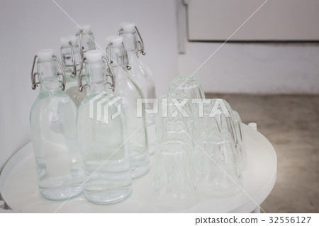 Tray of glasses and water bottles Tray of glasses and water bottles 32556127