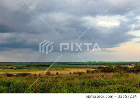 Summer landscape with dramatic sky on sunset 32557214