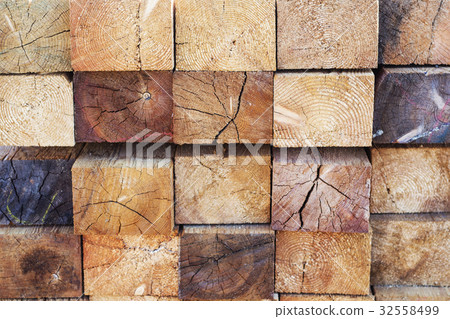wooden planks on a construction site. wooden planks on a construction site. 32558499