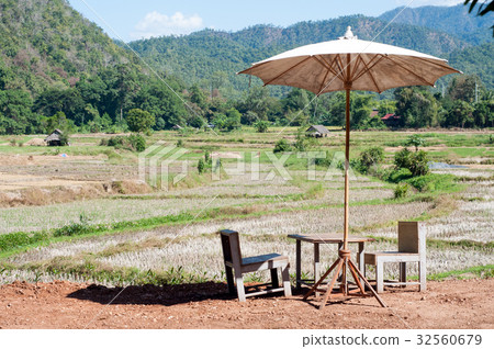 Table for sitting during the farm. 32560679