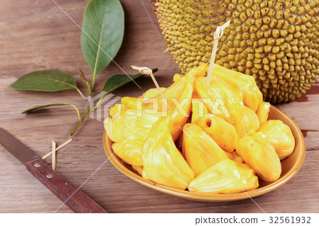 Tropical Jack Fruit on the wood background Tropical Jack Fruit on the wood background 32561932