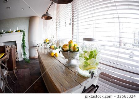 Candles and goblets on a decorated wedding table Candles and goblets on a decorated wedding table 32563324