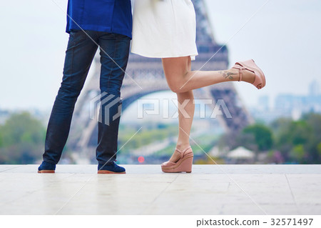 Romantic couple in Paris near the Eiffel tower 32571497