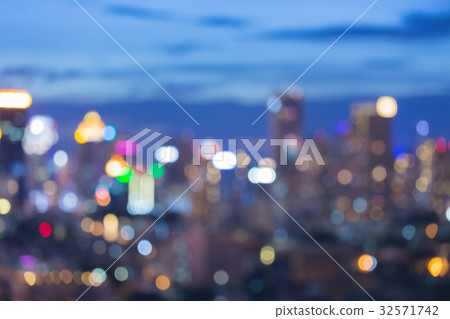 Twilight sky over city office blurred bokeh light Twilight sky over city office blurred bokeh light 32571742