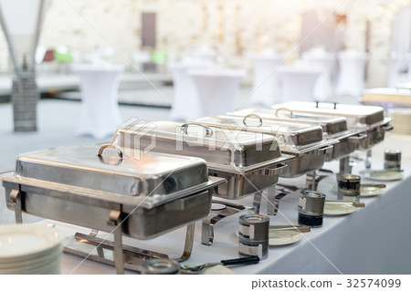 Buffet heated trays standing in line ready for Buffet heated trays standing in line ready for 32574099