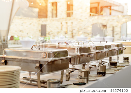 Buffet heated trays standing in line ready for Buffet heated trays standing in line ready for 32574100