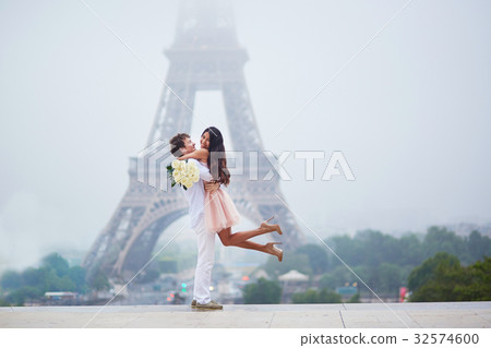 Romantic couple together in Paris Romantic couple together in Paris 32574600