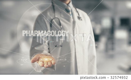 Doctor holding in hand Pharmacology Doctor holding in hand Pharmacology 32574932