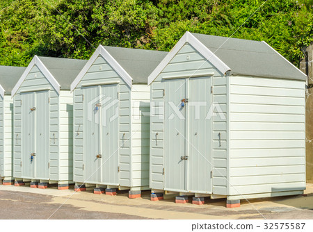 Colored houses on the beach, door  summer cottages 32575587