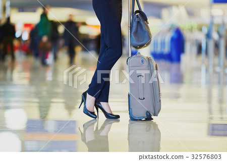 Young business woman in international airport 32576803