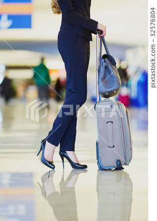 Young business woman in international airport 32576804