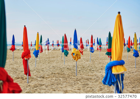 The famous colorful parasols on Deauville Beach, Normandy 32577470