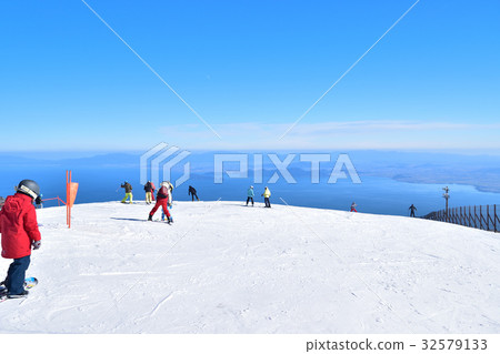 View of the slopes and lake Biwa in winter View of the slopes and lake Biwa in winter 32579133