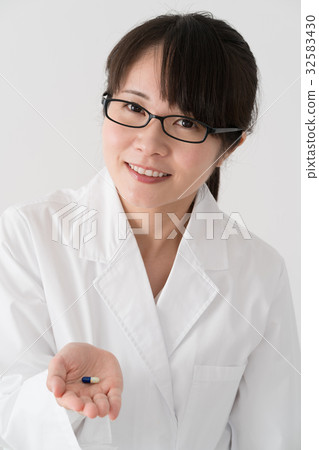 Doctor with medicine, pharmacist 32583430